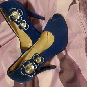 Pair of Delicacy Blue Suede, Open Toe, size 7 with a 4 inch heel.